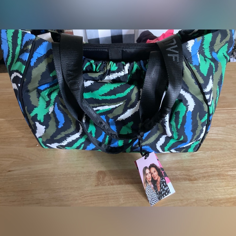 Diane Von Furstenberg laptop bag. Disco Zebra blue/green pattern